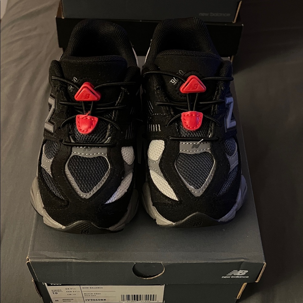 New Balance Kids' Black and Gray Sneakers with Red Accents